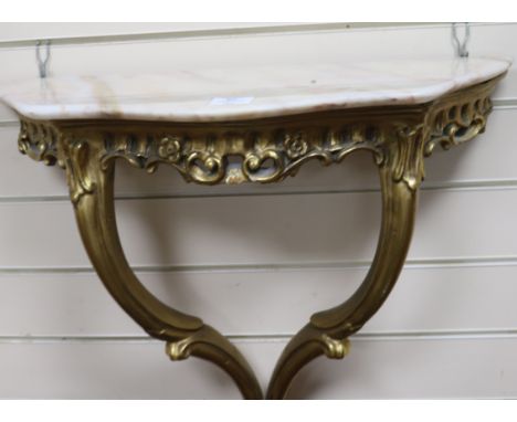 An Italian giltwood console table W.63cm