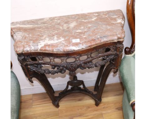 A Louis XVI style carved mahogany marble topped serpentine fronted console table W.79cm