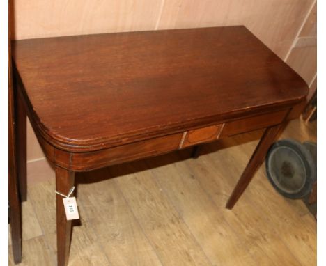 A George mahogany games table, the inner surfaces with chess and backgammon boards, W.95cm