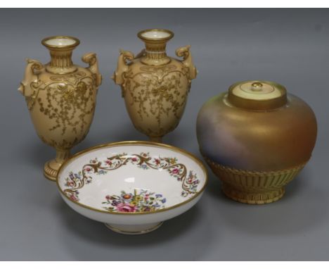 A small collection of Royal Worcester ceramics, including a pair of blush ivory twin-handled pedestal vases decorated with fl