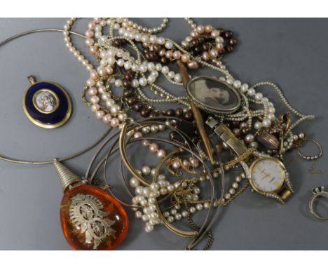 A 19th century gilt metal and enamel portrait pendant, two yellow metal bangles(a.f.) and a small group of costume jewellery