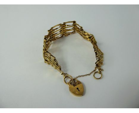 A 9 ct Gold Gate Link Bracelet, with heart from clasp, approx 7 gms 