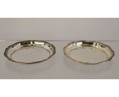 A Pair of Continental Silver Pin Dishes, mm Christophle, approx 71.3 gms, together with a Norwegian silver caddy spoon depict