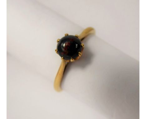 A Lady's 18 / 22 ct Yellow Gold and Blood Stone Ring, cabachon stone approx 6 mm, size R, approx 2.9 gms .