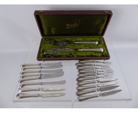 A Silver Handled Fish Slice and Fork, together with silver handled fruit knives and forks.