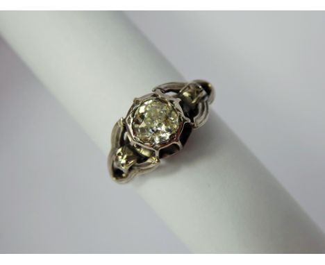 A Vintage 18 ct Hallmarked White Gold Old Cut Diamond Ring, approx 1 ct, the basket set ring having two diamonds to either si