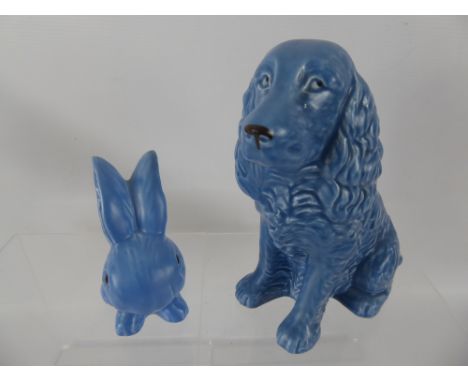 A Silver Sylvac Blue Spaniel, nr 1382, approx 19 cms high, together with two Sylvac style rabbits.