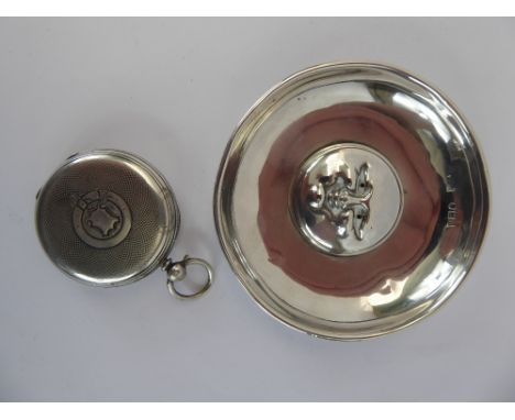 A Silver 'Man in the Moon' Pin Dish, London hallmark, dated 1916/17 mm rubbed, a silver cased pocket watch, white enamel face