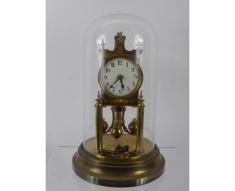 A Gustav Becker Germany Brass Anniversary Clock, nr 2484304, beneath a glass dome, the circular plinth engraved Psalm CXXVIII