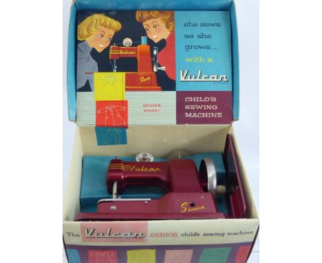 A Vintage Vulcan Snr Child's Sewing Machine, in the original box.