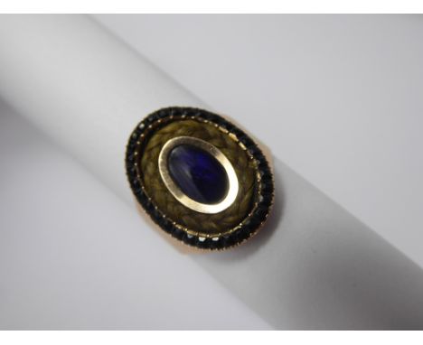 A Gentleman's Antique Yellow Gold Enamel and Jet Mourning Ring, a midnight blue enamel intaglio, with jet surround, approx P+