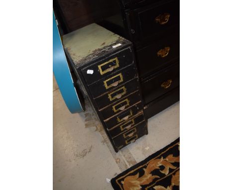 A set of vintage wooden filing or parts drawers having brass label holders
