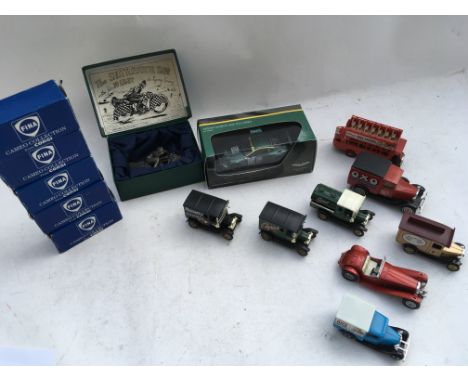 A collection of boxed and loose Diecast vehicles including Lledo, Corgi, Ixo Aston martin and a motorcycle, made by Glen Engl