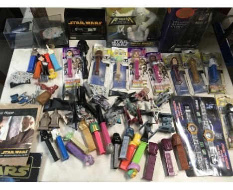 Star Wars, box containing boxed Battle master fig, Pez containers, Mini light sabre, star fleet models, etc