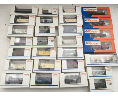 A box containing Marklin and Roco railways , OO scale, Rolling stock , boxed