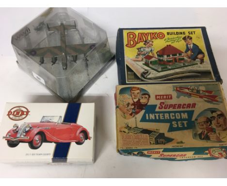 A collection of boxed toys including Supercar 1960s intercom set, Bayko building , a Corgi aircraft and a Dinky boxed Triumph