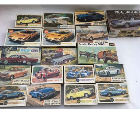 Airfix models, Revell and Aurora, a collection of boxed unused 1:32 scale 1970s cars model kits including Ford Escort, Capri,