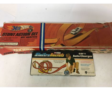 Hot wheels , stunt action set, boxed and Corgi electro rockets , car and auto charger, boxed