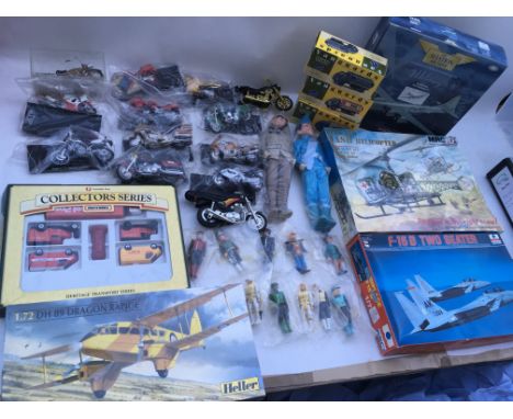 A box containing a collection of Maisto Motorcycles, Model kits, Corgi Aviation archive Boeing B25, Matchbox collectors set a