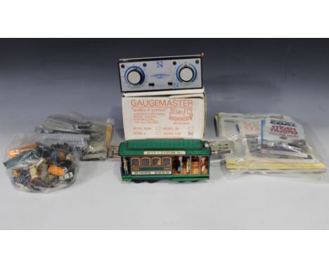 A collection of Fleischmann and other gauge N locomotives and rolling stock, a collection of Tri-ang ships and accessories, a