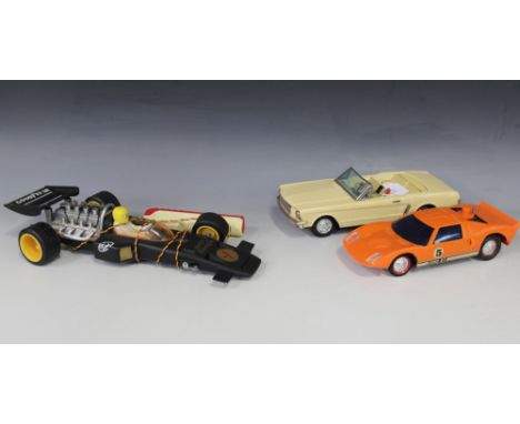 A Bandai tinplate No. 4104 Mustang Gear Shift Car, finished in light brown, length approx 29cm, a battery operated computer c