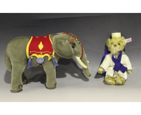 A modern Steiff limited edition teddy bear King Balthazar and elephant, No. 706/1500, with gilt button and tab in left ear, t