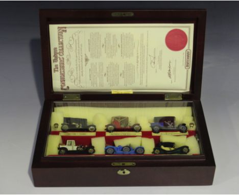 A collection of Matchbox Models of Yesteryear vehicles, including a Connoisseurs Set of six cars, cased, a pipe stand mounted