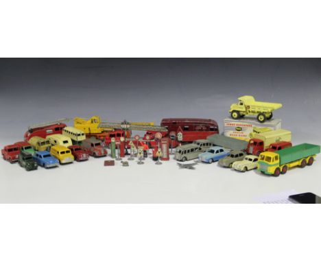 A collection of Dinky Toys and Supertoys vehicles and accessories, including a No. 965 Euclid rear dump truck, a No. 736 Hawk