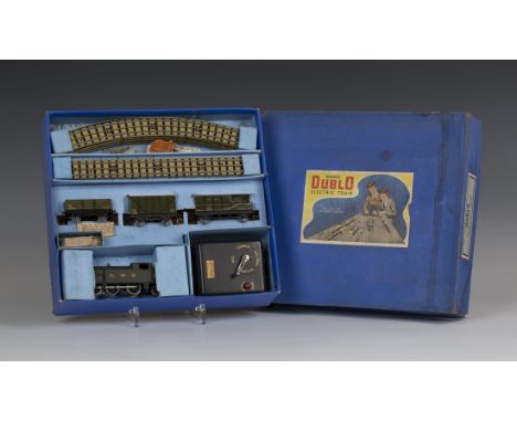 A Hornby Dublo three rail EDG7 tank goods train set, comprising an 0-6-2 tank locomotive no. 6699, finished in GWR green live