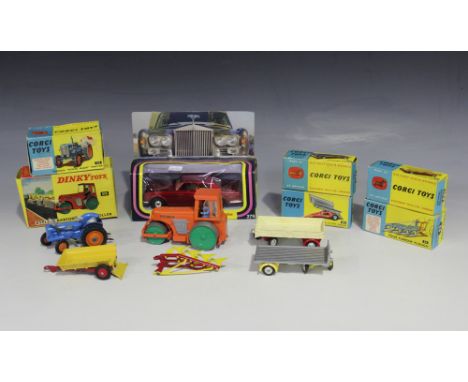 A small collection of Corgi Toys, comprising a No.55 Fordson 'Power Major' tractor, a No. 51 Massey-Ferguson 30CWT trailer, a