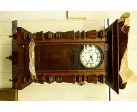 An early 20thC stained beech cased Vienna style regulator, the 8 day movement faced by a white enamel Roman dial  24''h  14''
