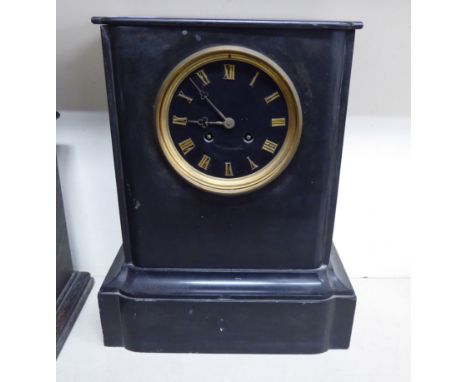 A 1930s French slate cased mantel clock, on a stepped breakfront plinth; the movement inscribed 'HRV Marc A Paris' with a Rom