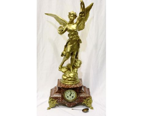 Japy Freres 19th century French clock, rouge marble cased surmounted with a gilt spelter figure, La Fortune, chiming on a bel