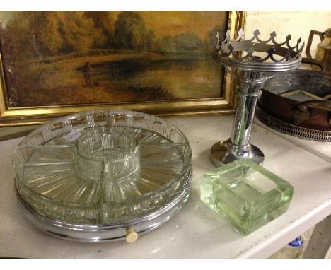 An Art Deco glass and chrome plated revolving hors d'oeuvres tray together with a chrome plated candle lamp base and Deco gla