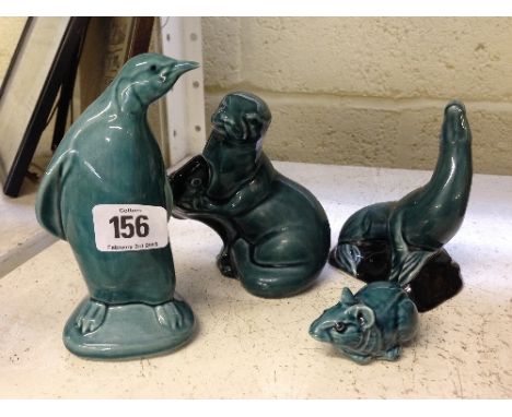 Four various Poole Pottery blue glazed animal figures.