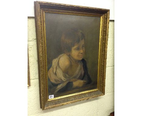 A gilt framed and glazed oil on canvas: Portrait of a young boy.