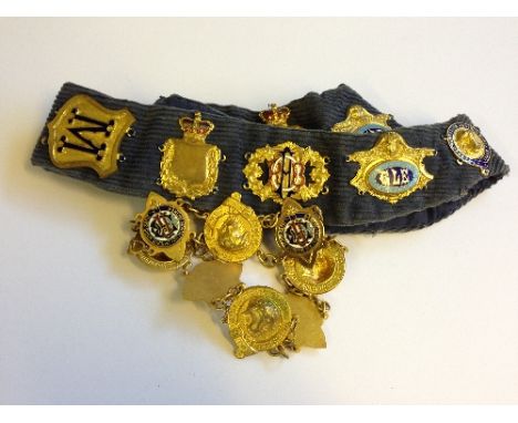 Two Order of Buffalo Chains of Office mounted with various enamel and metal badges.
