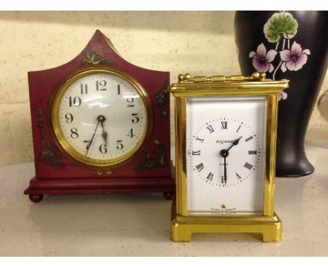 A Bayard brass and glass cased carriage clock together with a red lacquer Chinoiserie style cased mantle clock.