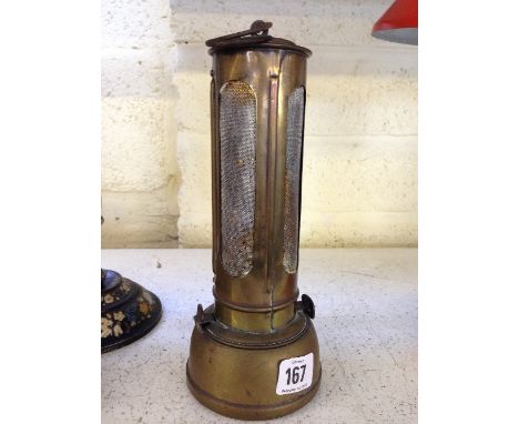 An early 20th century brass Powell & Hanmer 'The Nobby' hanging car heater oil lamp.