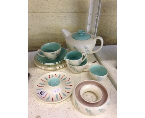 An Early Morning Poole Pottery tea service decorated in the NN pattern together with a Freeform ashtray decorated in the UFT 