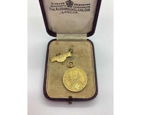A 9ct Gold "LONDON MIDLAND &amp; SCOTTISH RAILWAY" St Johns Ambulance Medallion, engraving to reverse, together with a 9ct go