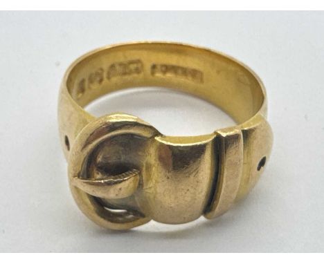 An 18ct Gold Buckle Style Ring (finger size K) (6.5grams).Antique Victorian hallmark, allover abrasions, no signs of thinning
