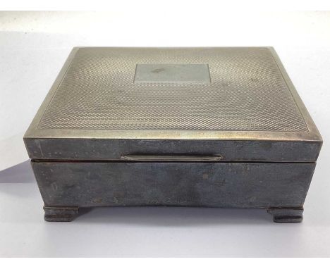 A Hallmarked Silver Cigarette Box, FH, Birmingham 1974, of rectangular form with engine turned design to hinged lid, vacant r