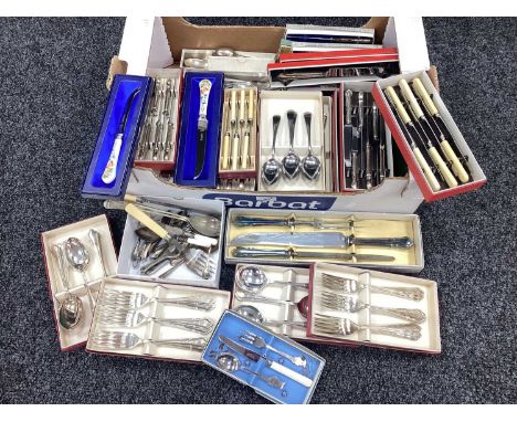 A Quantity of Boxed Plated Flatware, to include baby spoon, fork and knife set, carving set, EPNS table spoons, soup spoons, 
