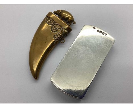 A Victorian Hallmarked Silver Vesta Case, EHS, London 1876, of shaped rectangular form with sliding mechanism, approximately 