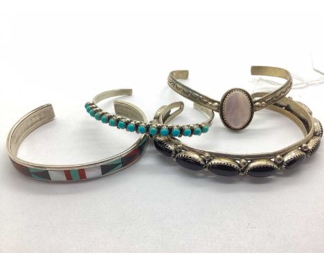 A Small Collection of Navajo Style Bangles, including all over collet set by M.Davis, cabochon set by Pam Mahooty, panel inse