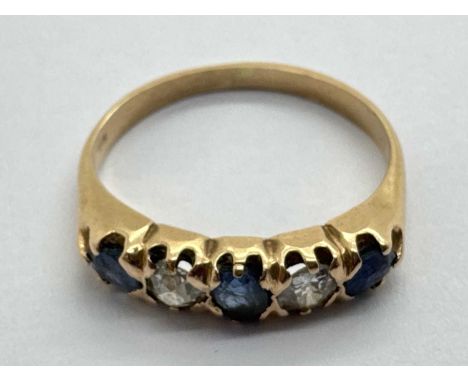 A 9ct Gold Sapphire and Diamond Five Stone Ring, collet set throughout between tapered shoulders (finger size Q) (3.6grams).