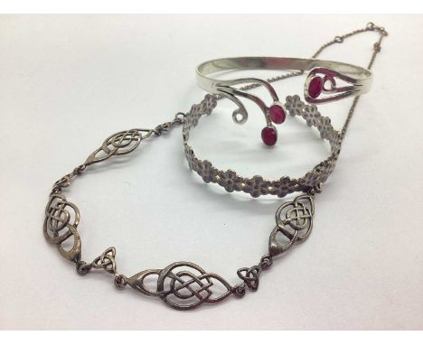 A Celtic Style Panel Necklace, the Celtic panels suspended on chain link connections, together with a hardstone inset cuff ba