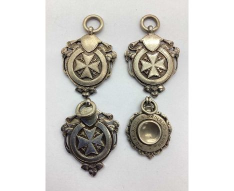 Three Hallmarked Silver St. John Ambulance Medallion Pendants, each engraved "Squires Cup" to reverse, another similar (total