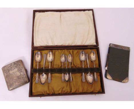 A quantity of hallmarked silver to include teaspoons and coffee spoons, a cigarette case and a leather bound note pad with si